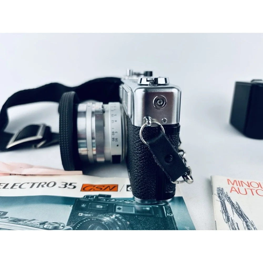 Yashica Vintage Electro 35 GSN Camera & Minolta Electroflash 28 & Film & Books